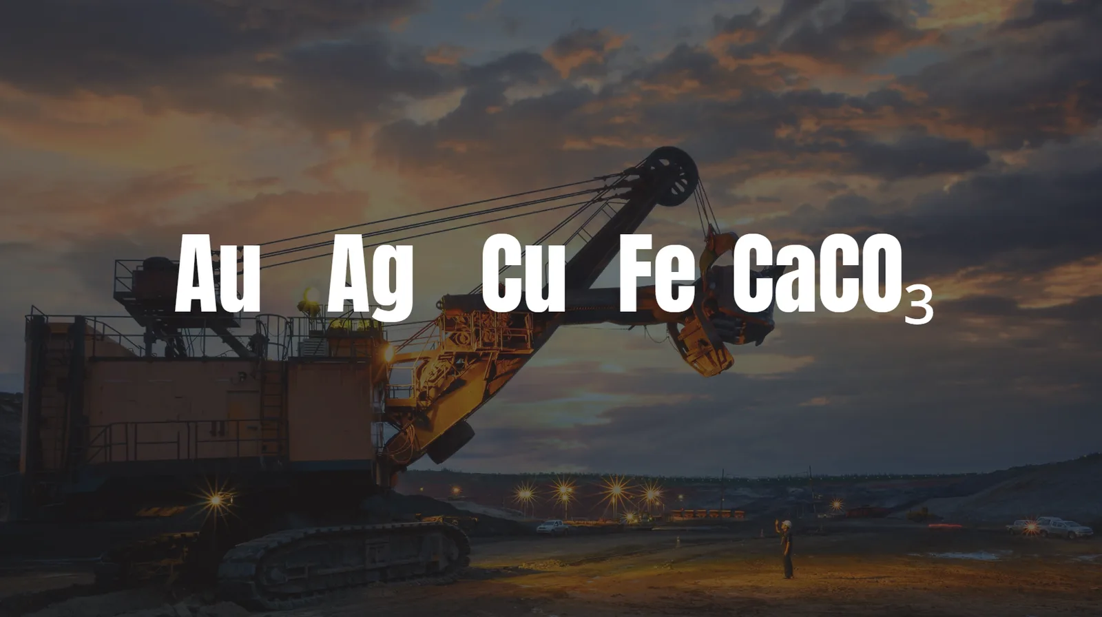 Open-pit mine excavator at dusk — Au, Ag, Cu, Fe, CaCO3